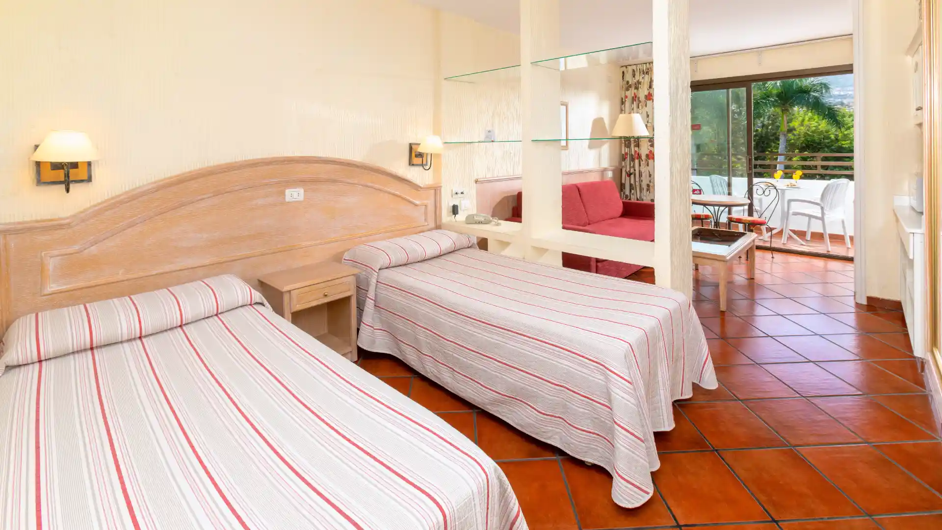 bed in studio for 3 adults at Apartamentos Masaru